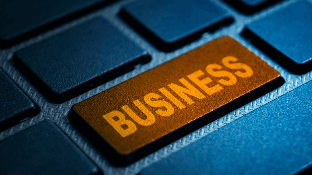 A keyboard with a key that says business.